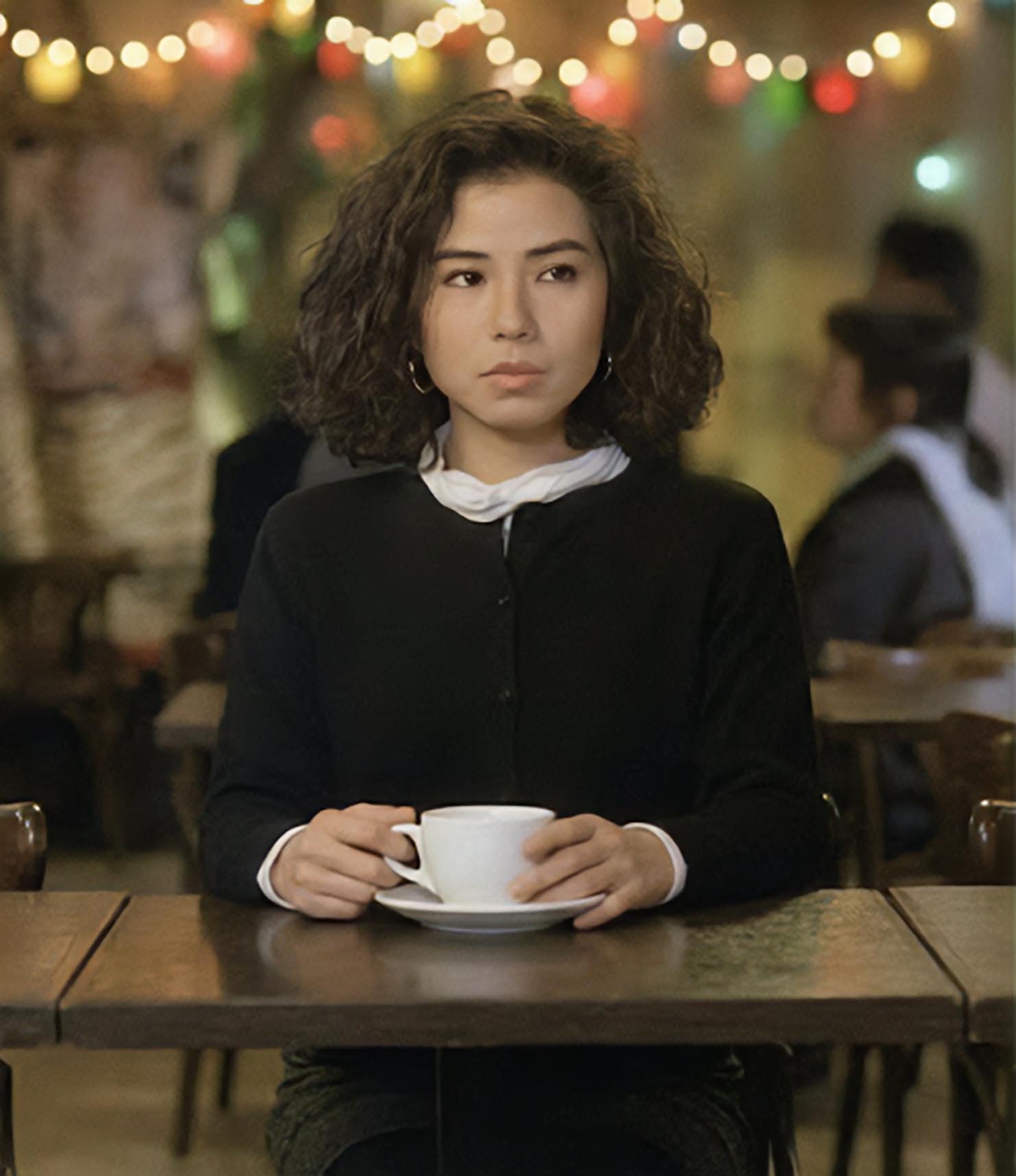 Woman looking out window